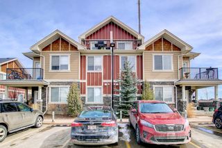 Photo 1: 6 67 West Coach Manor SW in Calgary: West Springs Row/Townhouse for sale : MLS®# A1226623