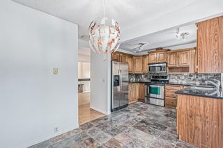 Photo 6: 136 Glamis Terrace in Calgary: Glenbrook Row/Townhouse for sale : MLS®# A2026410