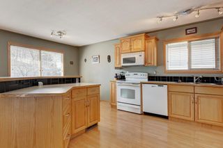 Photo 8: 11 Midlawn Green SE in Calgary: Midnapore Detached for sale : MLS®# A2037012