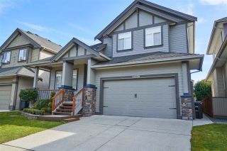 Photo 1: 11228 TULLY Crescent in Pitt Meadows: South Meadows House for sale in "Bonson's Landing" : MLS®# R2246447