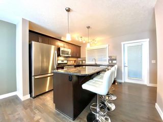 Photo 7: 9 1302 Russell Road NE in Calgary: Renfrew Row/Townhouse for sale : MLS®# A1156563