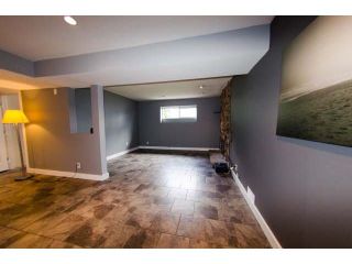 Photo 11: 1001 WINDWARD Drive in Coquitlam: Ranch Park House for sale in "Ranch Park" : MLS®# R2248714