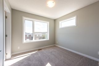 Photo 28: 121 301 REDSTONE Boulevard in Calgary: Redstone Row/Townhouse for sale : MLS®# A1246267