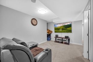 Photo 26: 702 Redstone Crescent NE in Calgary: Redstone Row/Townhouse for sale : MLS®# A2075520