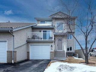 Main Photo: 56 5790 Patina Drive SW in Calgary: Patterson Row/Townhouse for sale : MLS®# A2035746
