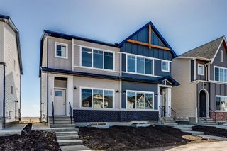 Photo 1: 7569 202 Avenue SE in Calgary: C-390 Semi Detached (Half Duplex) for sale : MLS®# A2045072
