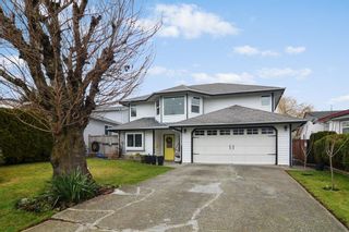 Photo 1: 26507 28A Avenue in Langley: Aldergrove Langley House for sale : MLS®# R2655099