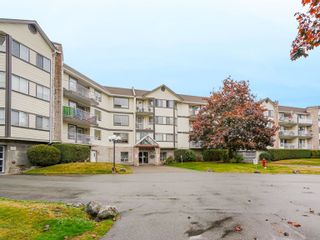 Photo 3: 110 5710 201 Street in Langley: Langley City Condo for sale : MLS®# R2734076