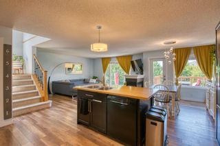 Photo 12: 69 Tuscany Way NW in Calgary: Tuscany Detached for sale : MLS®# A1239968
