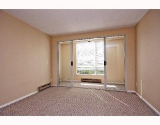 Photo 5: 404 2668 ASH Street in Vancouver: Fairview VW Condo for sale in "CAMBRIDGE GARDEN" (Vancouver West)  : MLS®# V733307