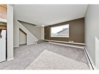 Photo 8: 118 3809 45 Street SW in Calgary: Glenbrook House for sale : MLS®# C4096404