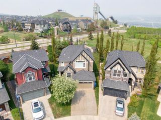 Photo 2: 124 Cougartown Close SW in Calgary: Cougar Ridge Detached for sale : MLS®# A2051695