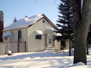 Photo 1: 452 CENTENNIAL Street in WINNIPEG: River Heights / Tuxedo / Linden Woods Residential for sale (South Winnipeg)  : MLS®# 1103160