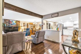 Photo 4: 104 Queensland Circle SE in Calgary: Queensland Detached for sale : MLS®# A2099342