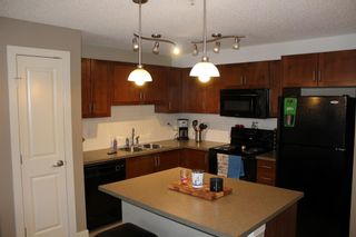 Photo 2: 209 162 Country Village Circle in Calgary: Country Hills Village Apartment for sale : MLS®# A1217676