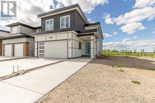 Photo 1: 1420 Halifax Road W in Lethbridge: House for sale : MLS®# A2059922