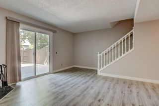 Photo 9: 34 6503 RANCHVIEW Drive NW in Calgary: Ranchlands Row/Townhouse for sale : MLS®# A1018661
