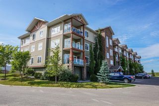 Photo 2: 304 4403 67A Avenue: Olds Apartment for sale : MLS®# A2008621