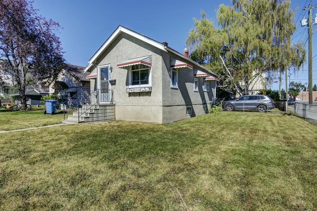Main Photo: 202 15 Avenue NW in Calgary: Crescent Heights Detached for sale : MLS®# A1054560