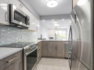 Photo 12: 312 4893 CLARENDON Street in Vancouver: Collingwood VE Condo for sale in "CLARENDON PLACE" (Vancouver East)  : MLS®# R2216672