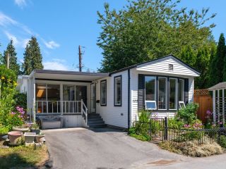Main Photo: 129 HIAWATHA Drive in West Vancouver: Park Royal Manufactured Home for sale in "Capilano River Park" : MLS®# R2887086