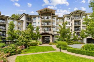 Photo 1: 209 3050 DAYANEE SPRINGS Boulevard in Coquitlam: Westwood Plateau Condo for sale : MLS®# R2509975