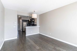 Photo 5: 12 133 Rockyledge View NW in Calgary: Rocky Ridge Row/Townhouse for sale : MLS®# A2120270