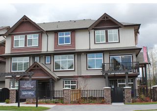 Photo 1: 114 19525 73rd in Surrey: Townhouse for sale