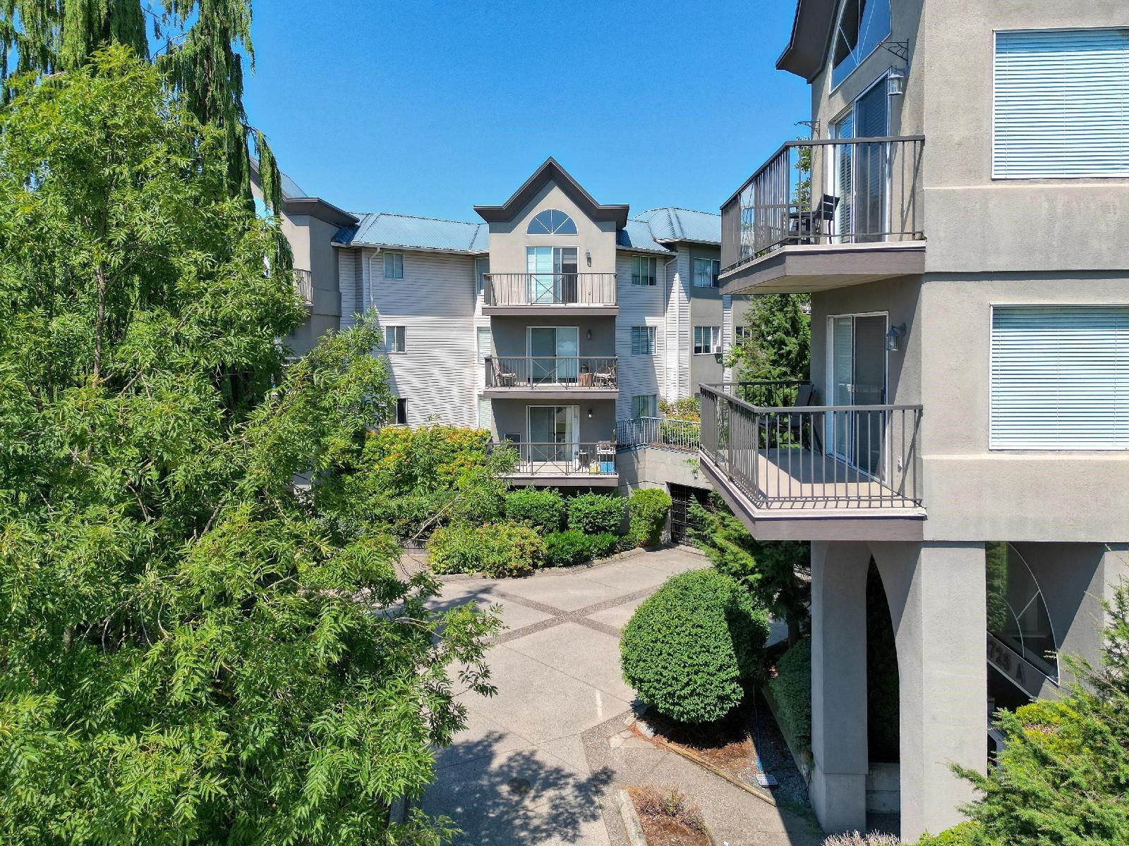 Main Photo: 203 32725 GEORGE FERGUSON Way in Abbotsford: Abbotsford West Condo for sale in "Uptown" : MLS®# R2711837