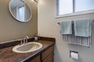 Photo 15: 7 Coach Manor Rise SW in Calgary: Coach Hill Detached for sale : MLS®# A2049271