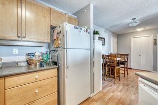 Photo 6: 409 16 Country Village Bay NE in Calgary: Country Hills Village Apartment for sale : MLS®# A2030230