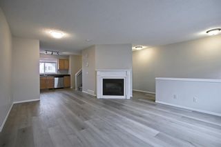 Photo 4: 180 Prestwick Acres Lane SE in Calgary: McKenzie Towne Row/Townhouse for sale : MLS®# A1161646