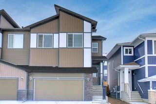 Main Photo: 126 Crestbrook Way SW in Calgary: Crestmont Semi Detached for sale : MLS®# A1209114