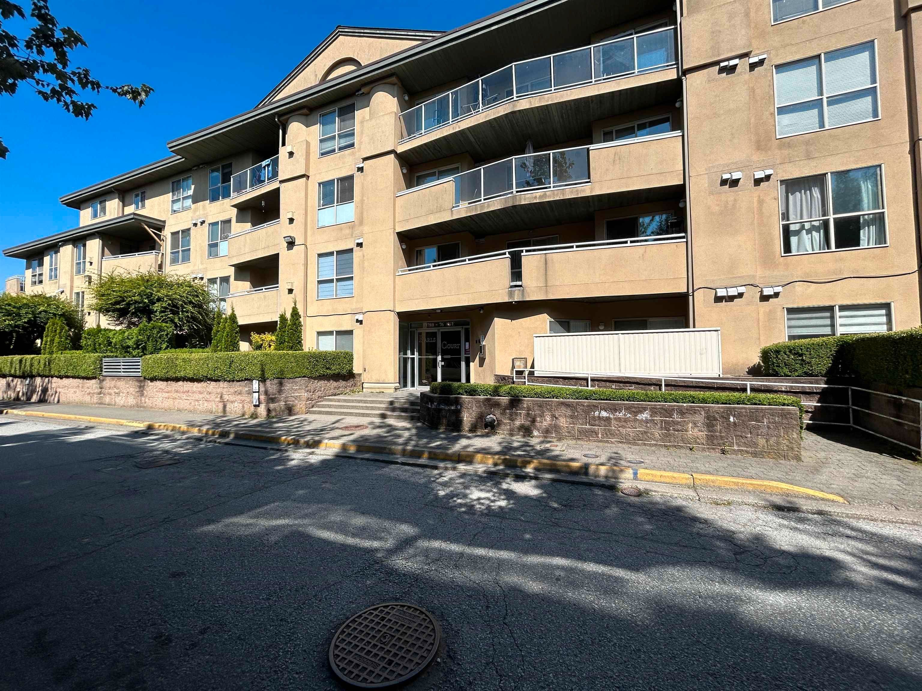 Main Photo: 402 13780 76 Avenue in Surrey: East Newton Condo for sale in "EARLS COURT" : MLS®# R2793051