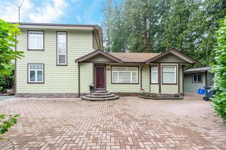 Photo 1: 19720 40A Avenue in Langley: Brookswood Langley House for sale : MLS®# R2646499