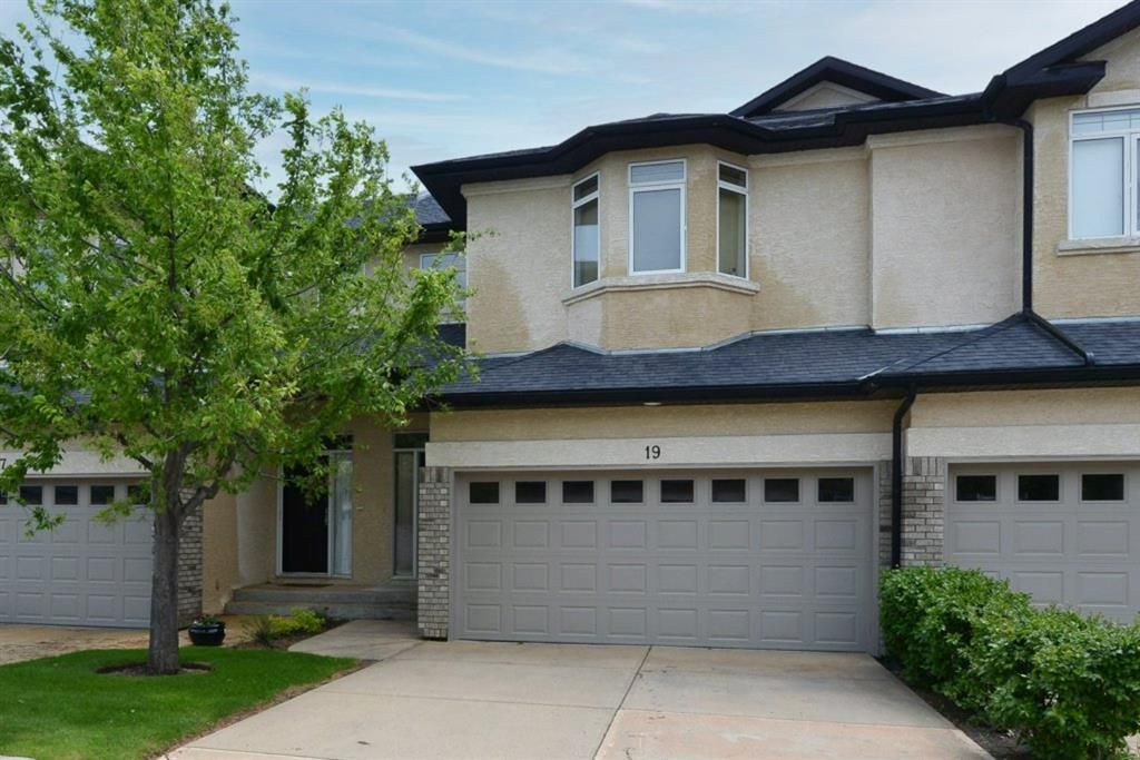 Main Photo: 19 Wentworth Cove SW in Calgary: West Springs Row/Townhouse for sale : MLS®# A1230824