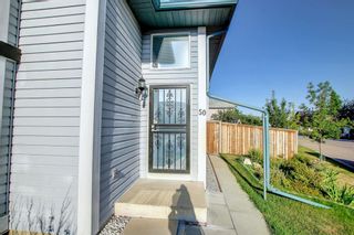 Photo 3: 50 Coverton Close NE in Calgary: Coventry Hills Detached for sale : MLS®# A1253289