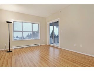 Photo 2: 408 5775 IRMIN Street in Burnaby: Metrotown Condo for sale in "MACPHERSON WALK" (Burnaby South)  : MLS®# V1097253