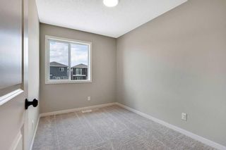 Photo 25: 225 Creekside Boulevard SW in Calgary: C-168 Semi Detached (Half Duplex) for sale : MLS®# A2062382