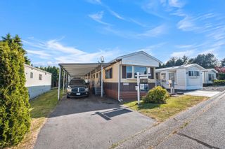 Photo 1: 15848 NORFOLK Road in Surrey: King George Corridor Manufactured Home for sale in "Cranley Park" (South Surrey White Rock)  : MLS®# R2784750