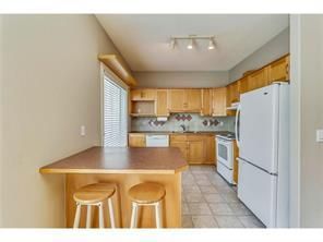 Photo 5: 183 Bridlewood View SW in Calgary: Bridlewood Row/Townhouse for sale : MLS®# A2014089