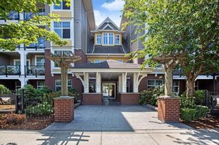 Photo 1: 203 17712 57A Avenue in Surrey: Cloverdale BC Condo for sale in "West on the Village Walk" (Cloverdale)  : MLS®# R2634173