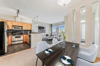 Photo 5: 8 133 Rockyledge View NW in Calgary: Rocky Ridge Row/Townhouse for sale : MLS®# A2104398