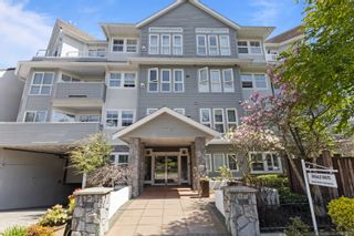 Photo 1: 102 1630 154 Street in Surrey: King George Corridor Condo for sale in "CARLTON COURT" (South Surrey White Rock)  : MLS®# R2773036