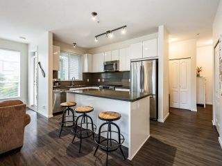 Photo 1: 207 1135 WINDSOR Mews in Coquitlam: New Horizons Condo for sale in "BRADLEY HOUSE" : MLS®# R2621965