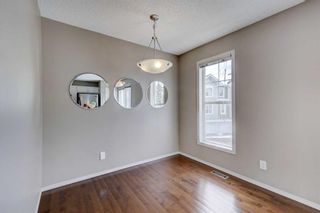 Photo 11: 790 Tuscany Drive NW in Calgary: Tuscany Row/Townhouse for sale : MLS®# A2109257
