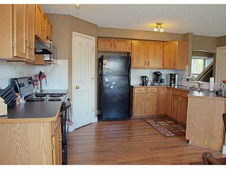 Photo 2: 73 CIMARRON Trail: Okotoks Residential Detached Single Family for sale : MLS®# C3619723