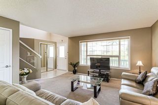 Photo 4: 77 Bridlewood Manor SW in Calgary: Bridlewood Detached for sale : MLS®# A1236404