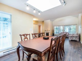 Photo 2: 404 2733 ATLIN PLACE in Coquitlam: Coquitlam East Condo for sale : MLS®# R2419896