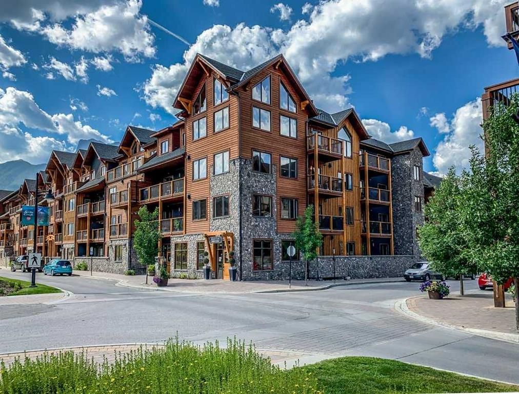 Main Photo: 409 707 Spring Creek Drive: Canmore Apartment for sale : MLS®# A2071089